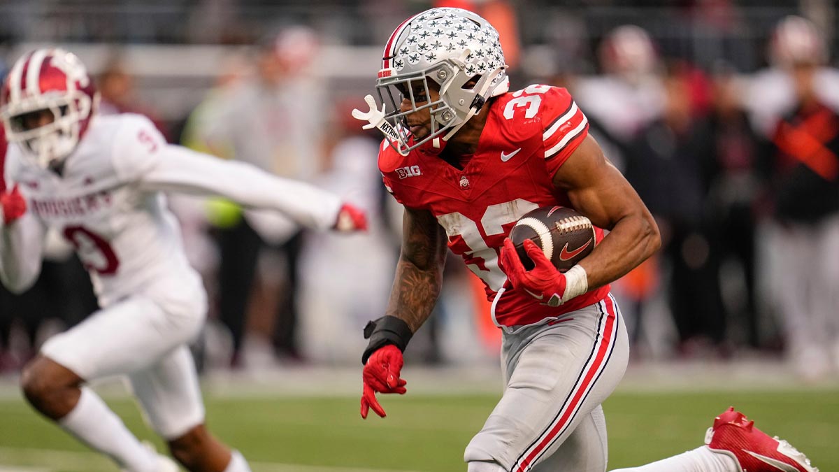 Ohio State Buckeyes running back TreVeyon Henderson (32) runs upfield during the NCAA football game against the Indiana Hoosiers at Ohio Stadium