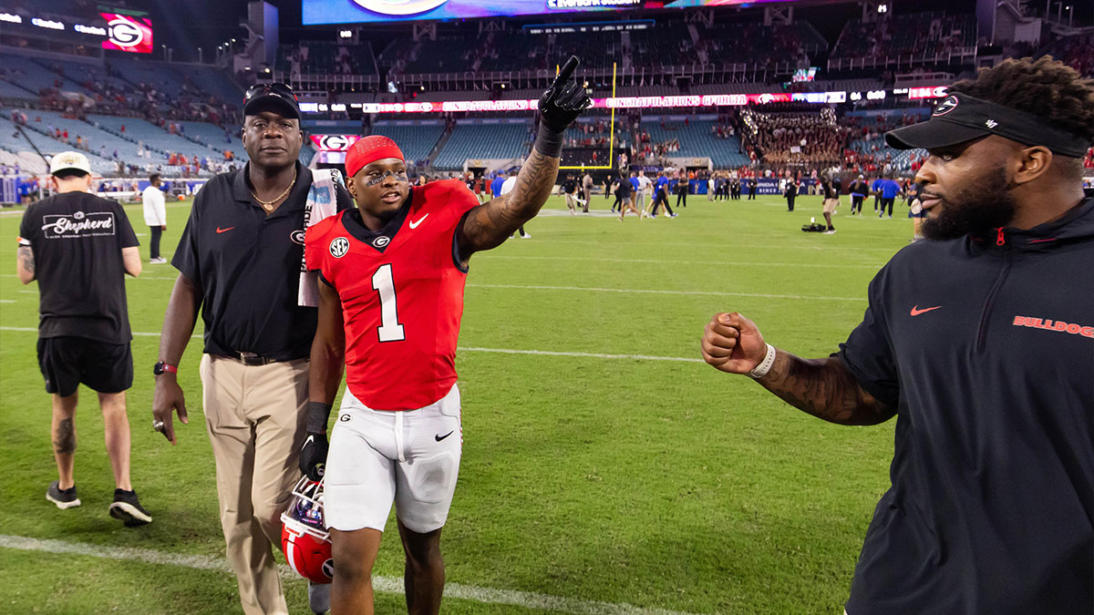 Georgia football Bulldogs running back Trevor Etienne (1) signals number 1 after the Bulldogs defeated the Gators at EverBank Stadium, The Bulldogs defeated the Gators 34-20.