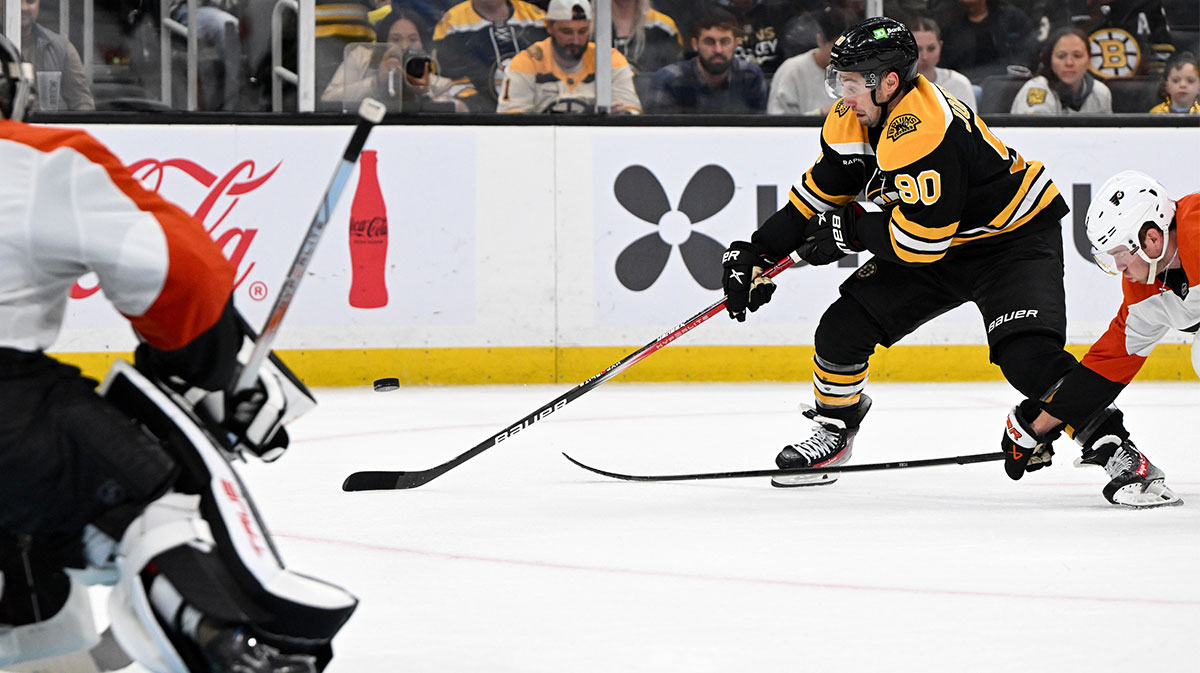 Boston Bruins forward Tyler Johnson (90) controls the puck against the Philadelphia Flyers during the third period at the TD Garden.