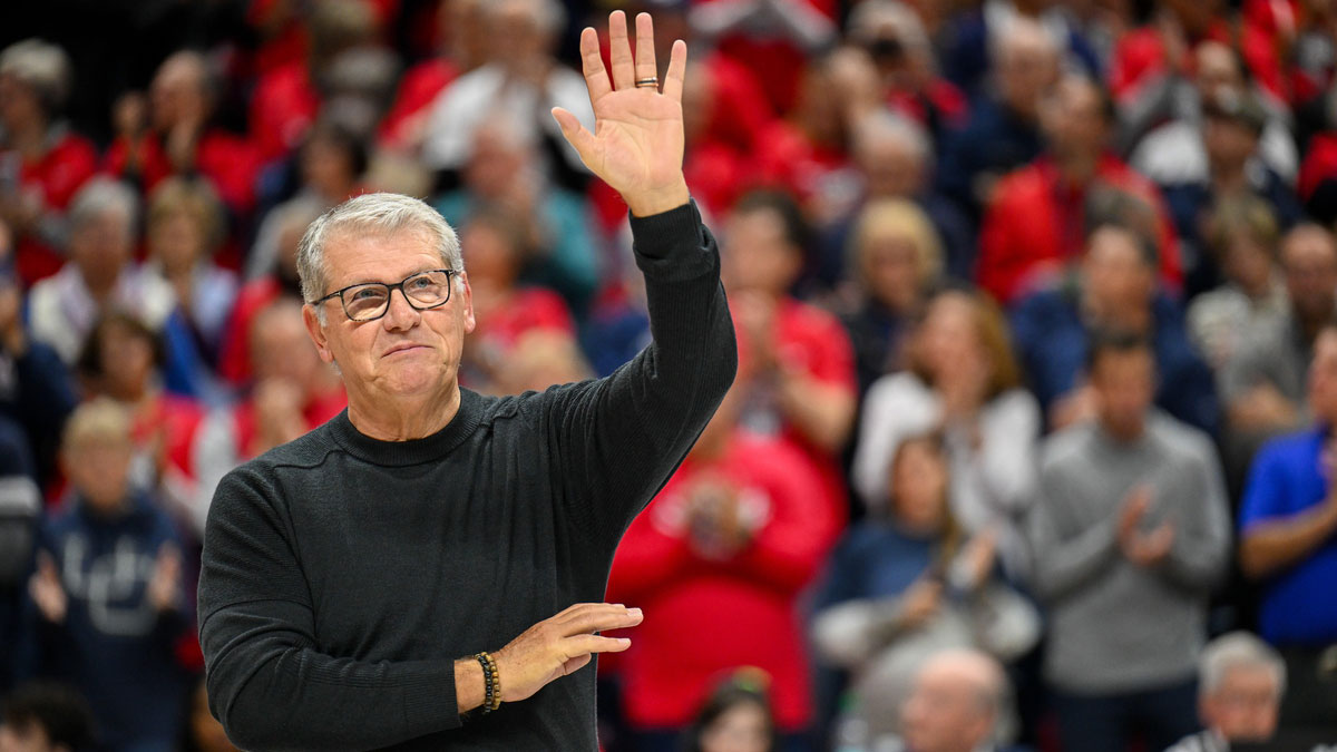 Connecticut Huskies head coach Geno Auriemma waves to the crowd before a game between the Connecticut Huskies and the Fairleigh Dickinson Knights at Harry A. Gampel Pavilion