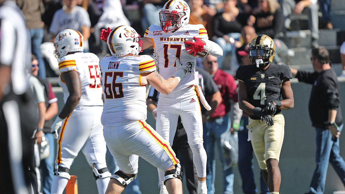 Louisiana Monroe Warhawks wide receiver Boogie Knight (17) celebrates his touchdown with Louisiana Monroe Warhawks offensive lineman Peyton Dunn (66) during the first half against the Army Black Knights at Michie Stadium.