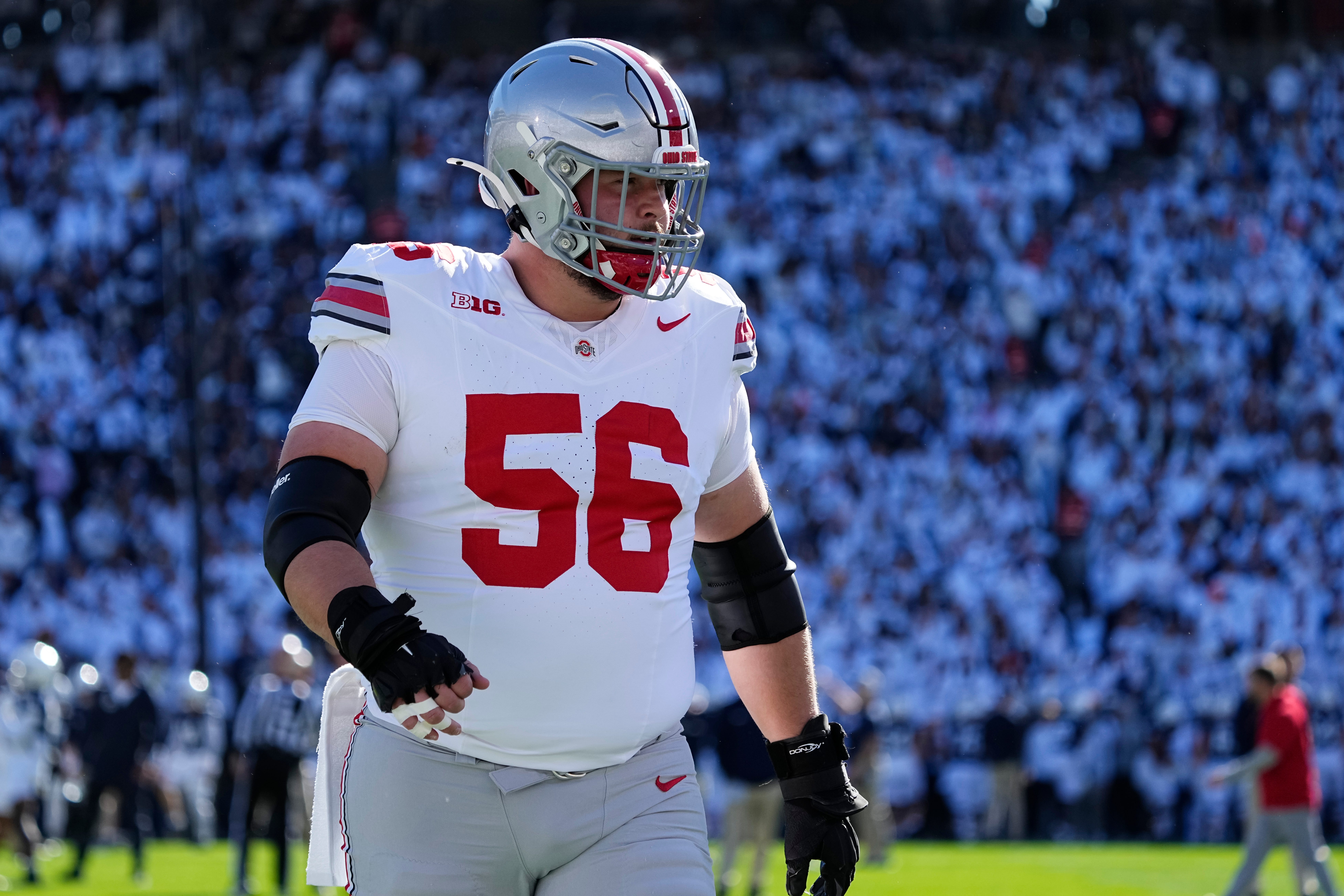 Ohio State Buckeyes offensive lineman Seth McLaughlin (56) warms up during the NCAA football game against the Penn State Nittany Lions at Beaver Stadium