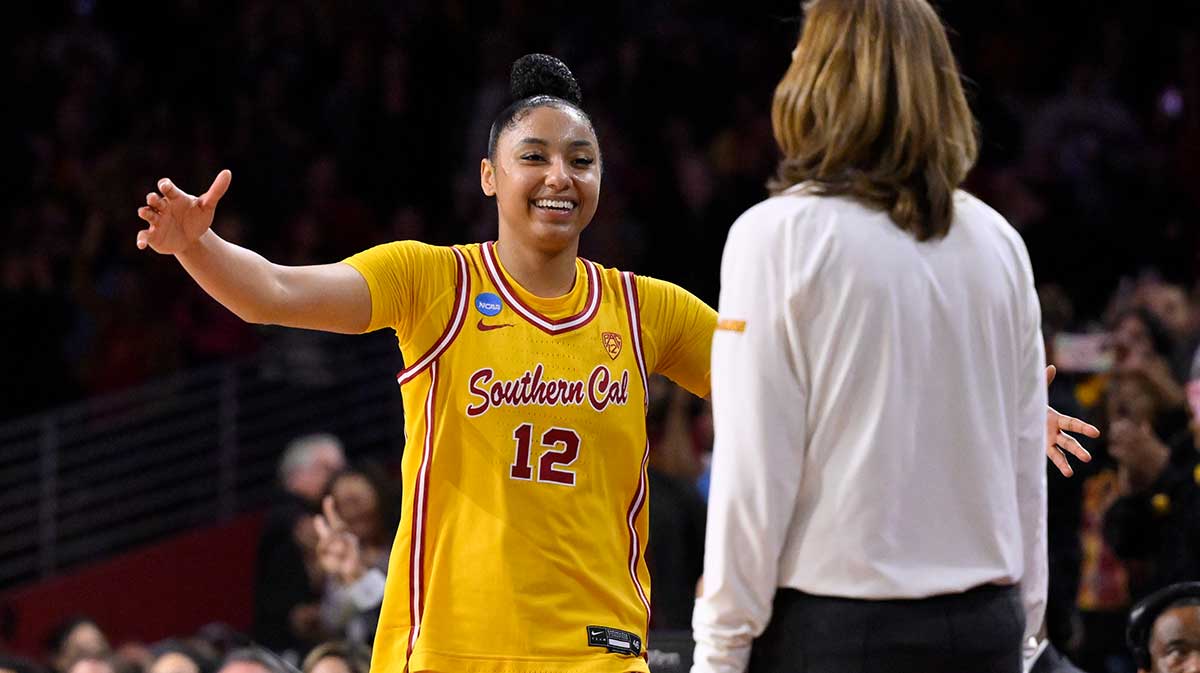 USC Trojans guard JuJu Watkins (12) hugs head coach Lindsay Gottlieb during a NCAA Women’s Tournament 2nd round game against the Kansas Jayhawks