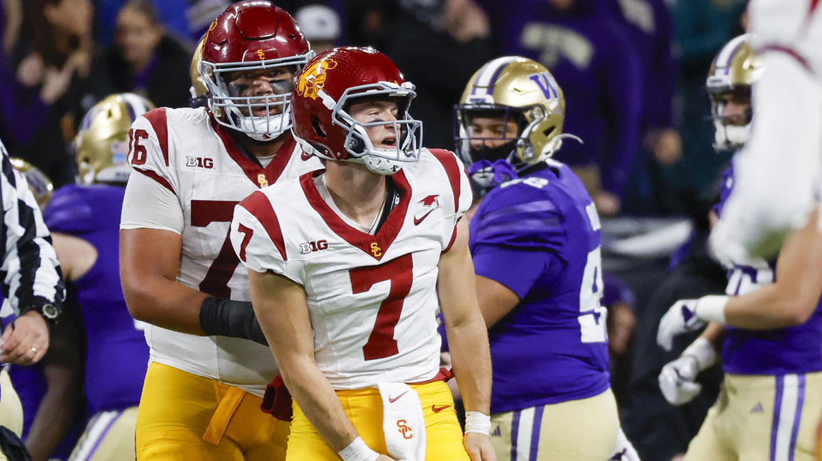 USC Trojans quarterback Miller Moss (7) reacts following a turnover on downs against the Washington Huskies during the fourth quarter at Alaska Airlines Field at Husky Stadium.