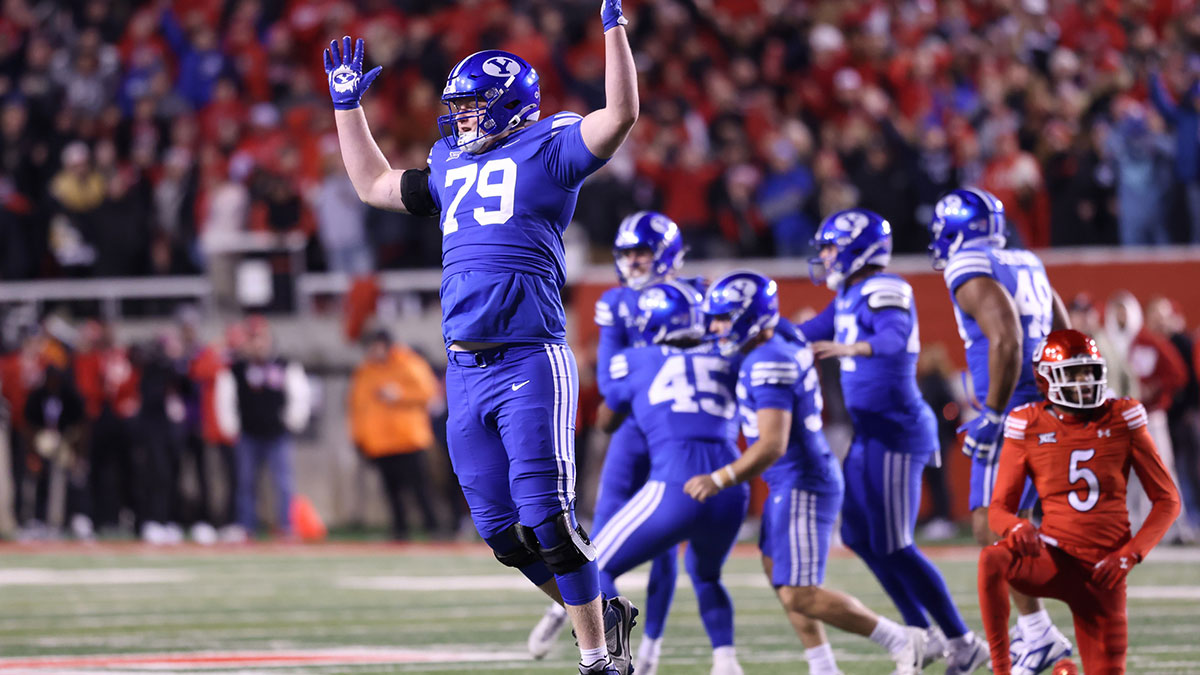 Nov 9, 2024; Salt Lake City, Utah, USA; Brigham Young Cougars offensive lineman Kaden Chidester (79) reacts after a Cougars field goal to defeat the Utah Utes at Rice-Eccles Stadium. 