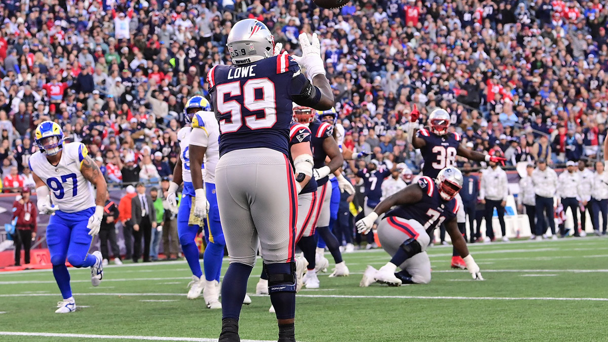 New England Patriots offensive tackle Vederian Lowe (59) makes a catch for a touchdown against the Los Angeles Rams during the second half at Gillette Stadium