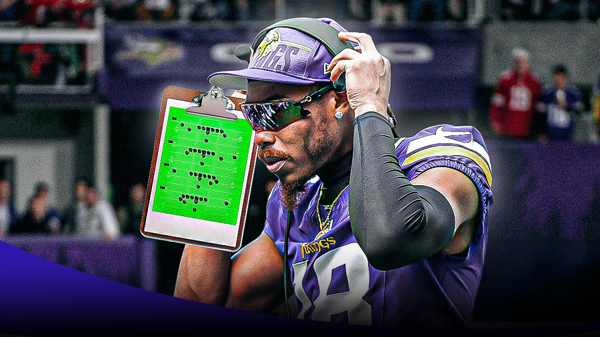 Minnesota Vikings WR Justin Jefferson with a coach's head set on with a gameplan sheet in his hands.