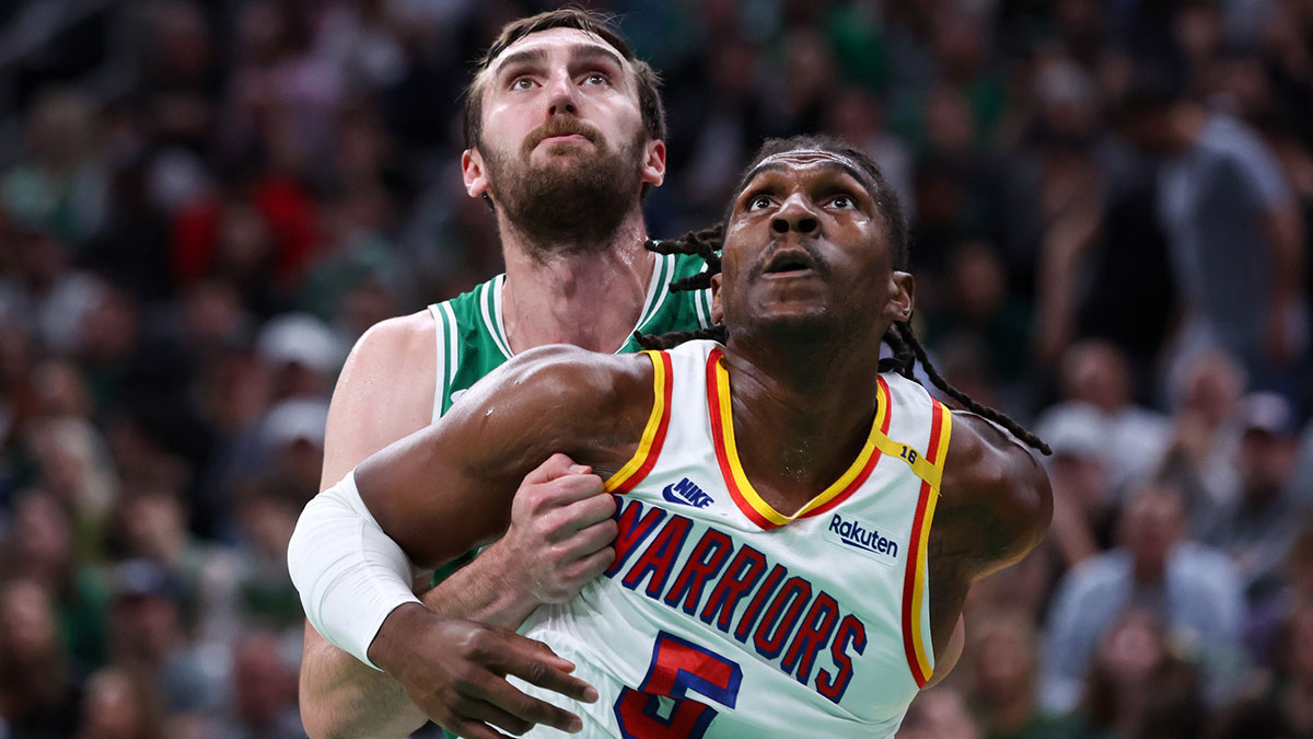 Golden State Warriors center Kevon Looney (5) boxes out Boston Celtics center Luke Kornet (40) during the first half at TD Garden