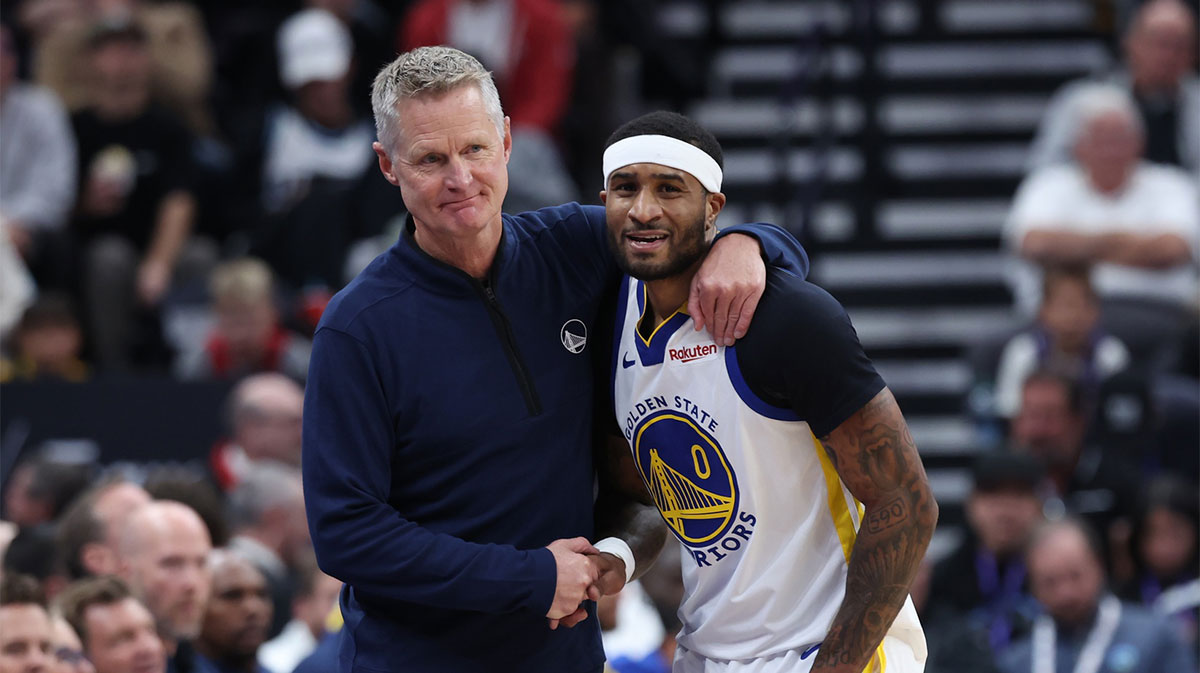 Warriors' Steve Kerr and Gary Payton II react during a game against the Jazz.