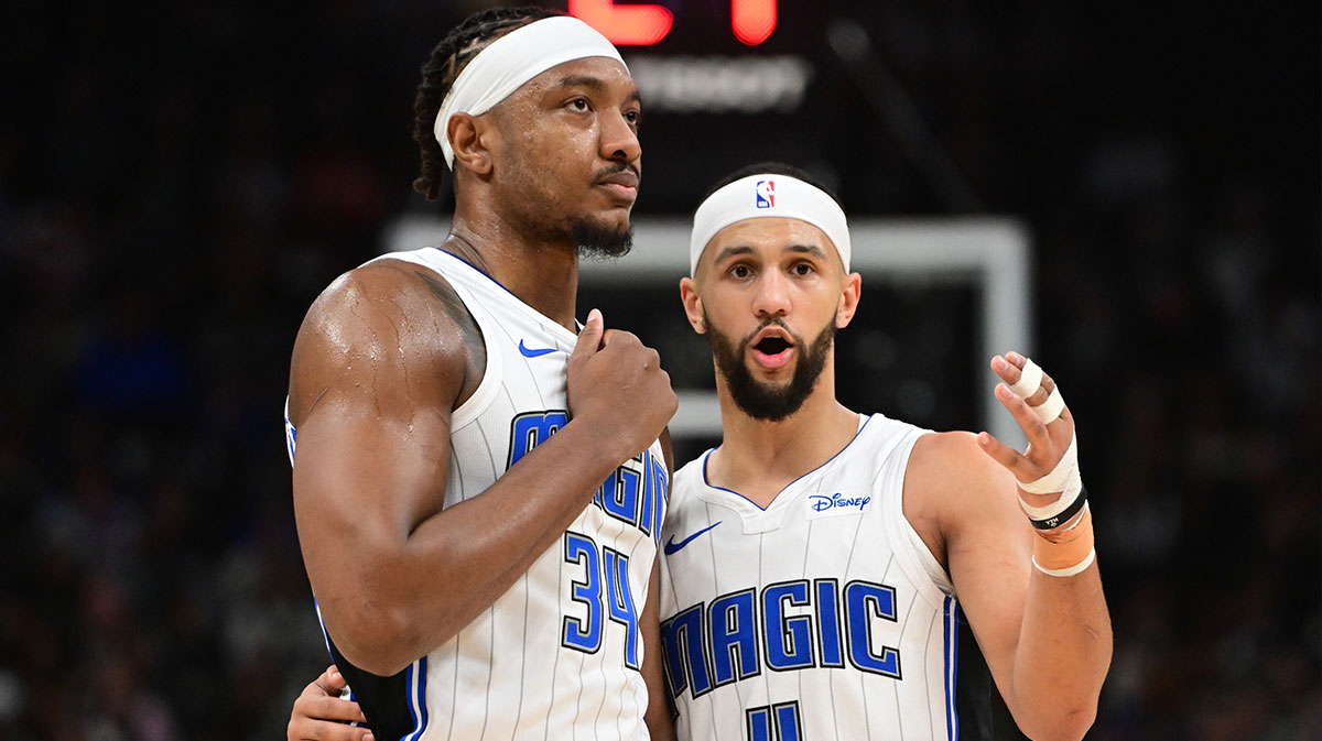 Orlando Magic center Wendell Carter Jr. (34) and Orlando Magic guard Jalen Suggs (4) talk in the third quarter against the Milwaukee Bucks at Fiserv Forum.