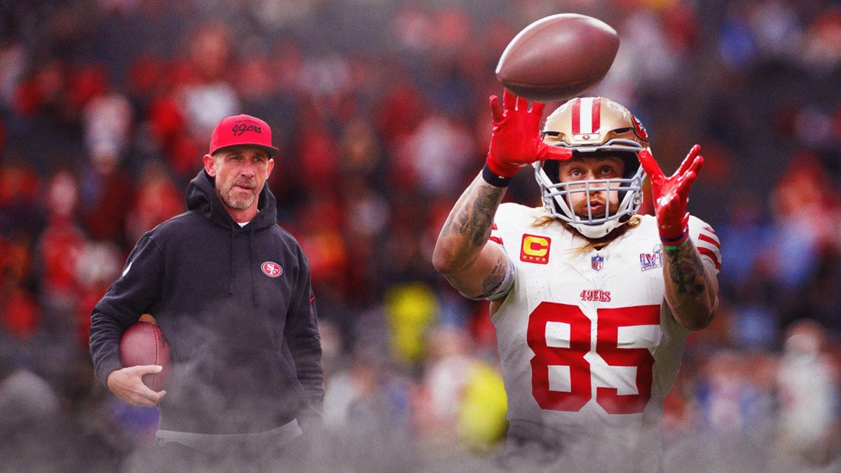 Kyle Shanahan watching and George Kittle making a big catch