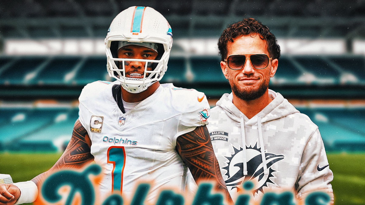 Tua Tagovailoa and Mike McDaniel in front of the Dolphins stadium