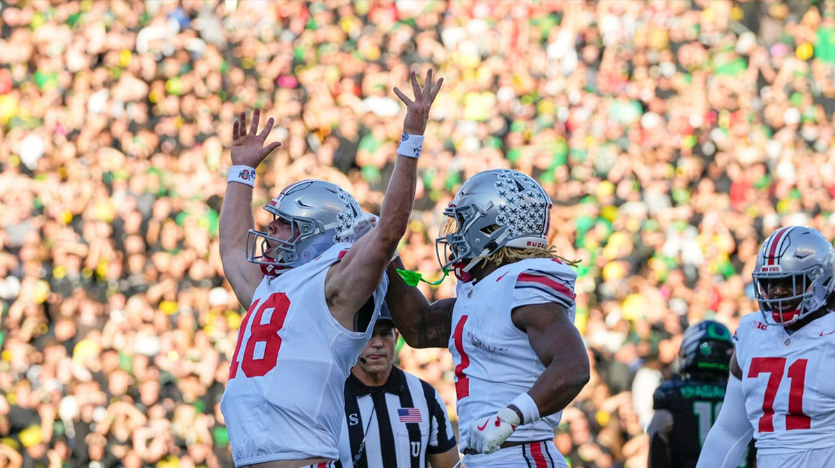 Ohio State Buckeyes quarterback Will Howard (18) celebrates scoring a touchdown during the first half of the NCAA football game against the Oregon Ducks at Autzen Stadium