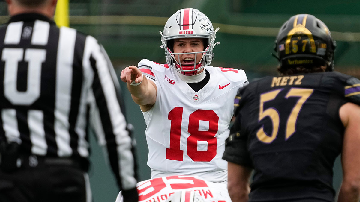 Ohio State Buckeyes quarterback Will Howard (18) calls out the defense during the NCAA football game against the Northwestern Wildcats at Wrigley Field