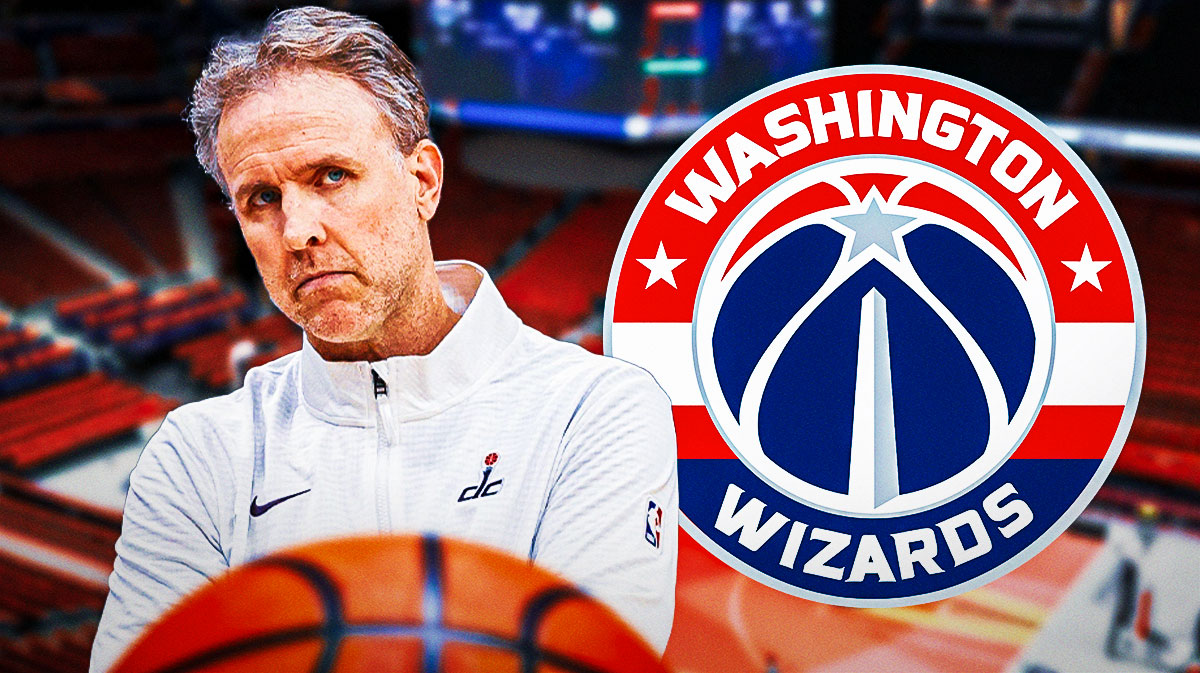 Brian Keefe looking disappointed next to a Wizards logo