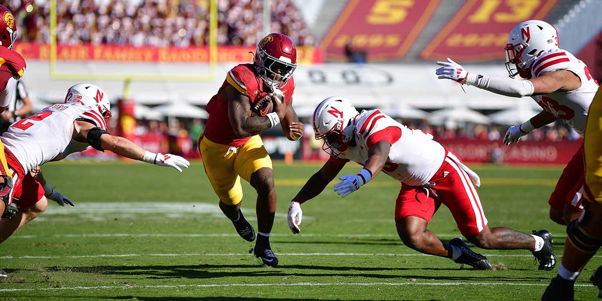 USC football Trojans running back Woody Marks (4) runs the ball against the Nebraska Cornhuskers during the first half at the Los Angeles Memorial Coliseum.