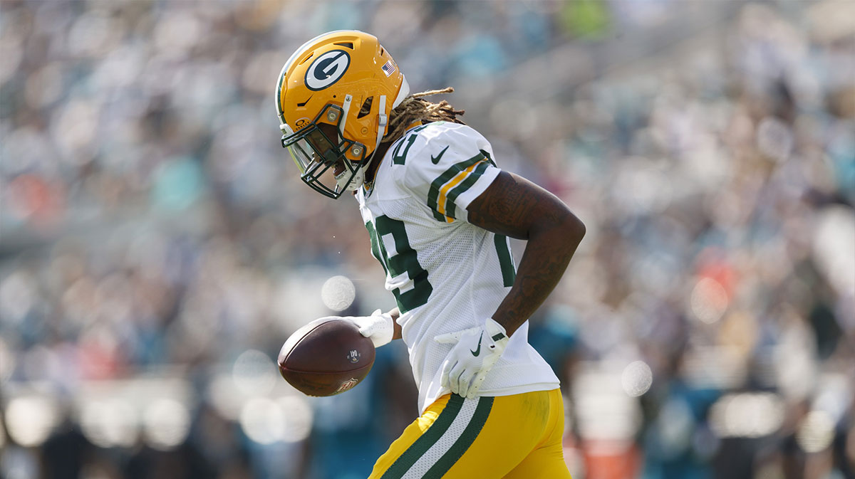 Green Bay Packers safety Xavier McKinney (29) celebrates an interception against the Jacksonville Jaguars during the second quarter at EverBank Stadium. 