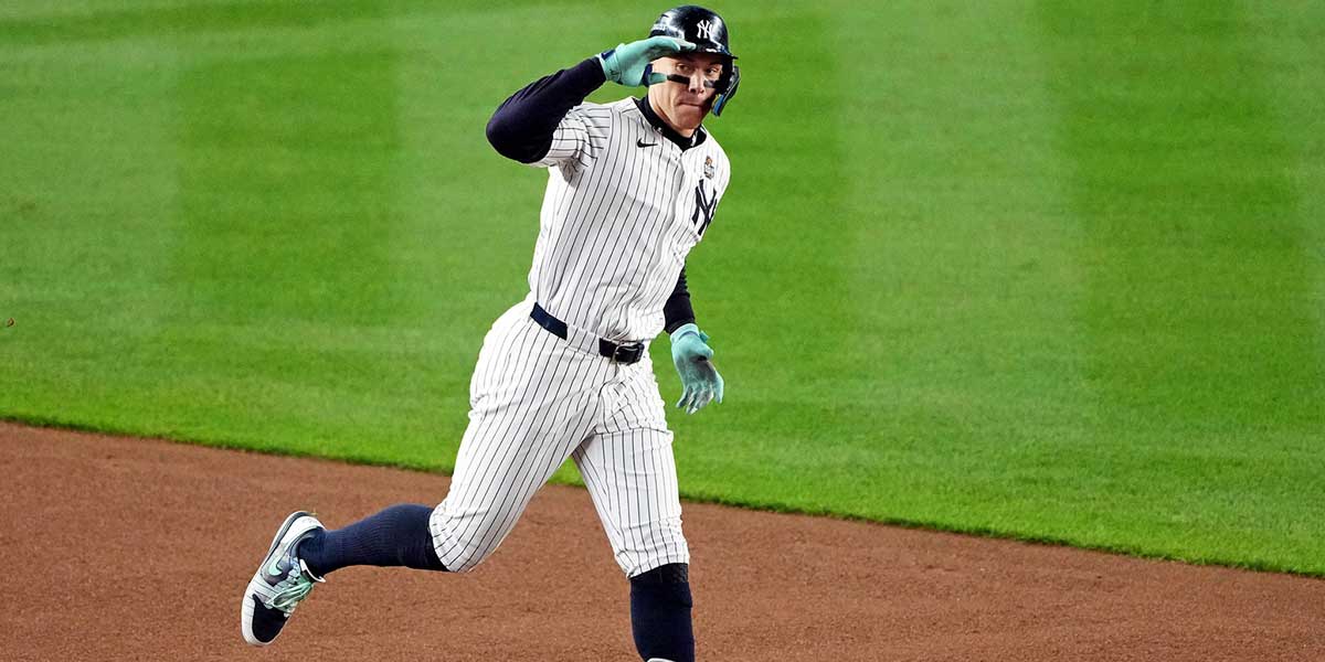 New York Yankees outfielder Aaron Judge (99) celebrates after hitting a two run home run during the first inning against the Los Angeles Dodgers in game four of the 2024 MLB World Series at Yankee Stadium.