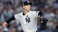 New York Yankees pitcher Luke Weaver (30) pitches during the ninth inning against the Los Angeles Dodgers in game four of the 2024 MLB World Series at Yankee Stadium