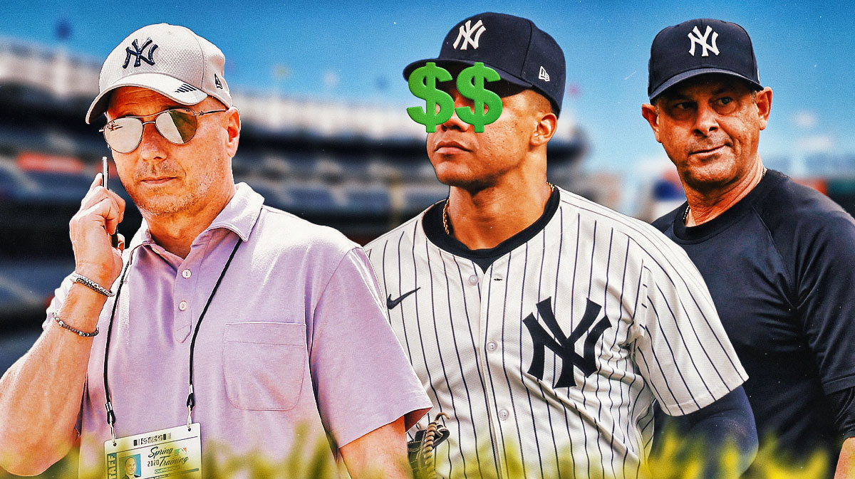 New York Yankees general manager Brian Cashman talking on phone or to the press on left side, New York Yankees outfielder Juan Soto with dollar signs over his eyes in center, New York Yankees manager Aaron Boone on right side, Yankee Stadium (home stadium of the New York Yankees) in background