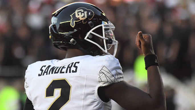 Colorado's Shedeur Sanders gestures after a touchdown against Texas Tech in a Big 12 football game