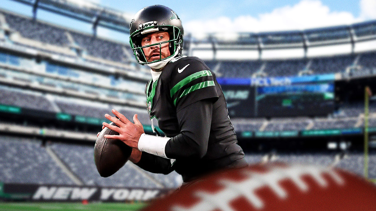 Aaron Rodgers in Jets uniform with stoic expression
