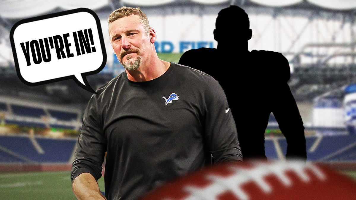 Detroit Lions HC Dan Campbell with a speech bubble above his head saying, "You're In!" next to a SILHOUETTE of Detroit Lions safety Jamal Adams. Background is Ford Field (Detroit Lions stadium).
