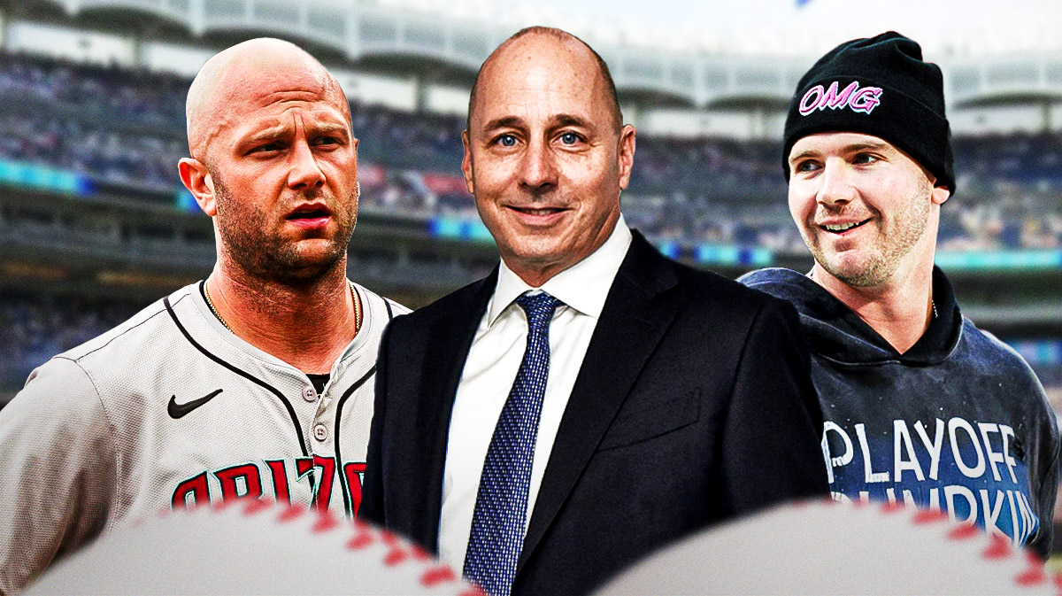 Brian Cashman front and center. Pete Alonso behind to right. Christian Walker behind to left