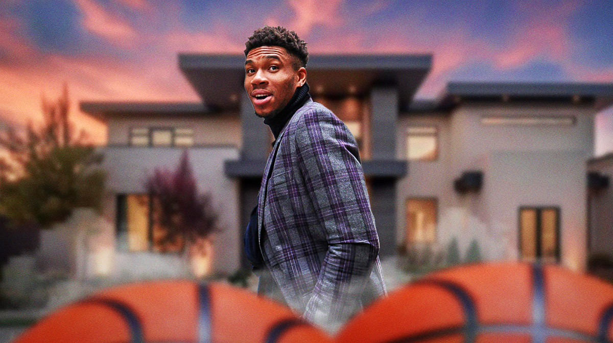 Milwaukee Bucks player Giannis Antetokounmpo in front of a house