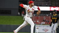 St. Louis Cardinals third baseman Nolan Arenado (28) forces out Pittsburgh Pirates shortstop Isiah Kiner-Falefa (7) and throws to first to complete the double play to end the third inning at Busch Stadium.