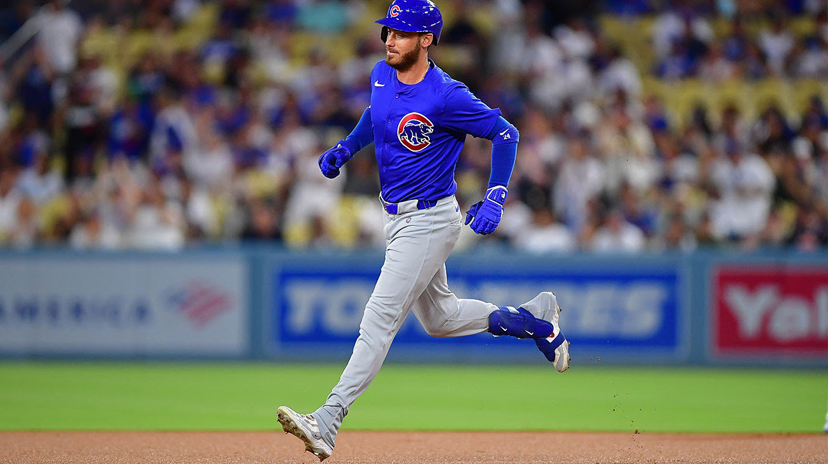 Chicago Cubs right fielder Cody Bellinger (24) runs the bases after hitting a solo home run against the Los Angeles Dodgers during the first inning at Dodger Stadium.