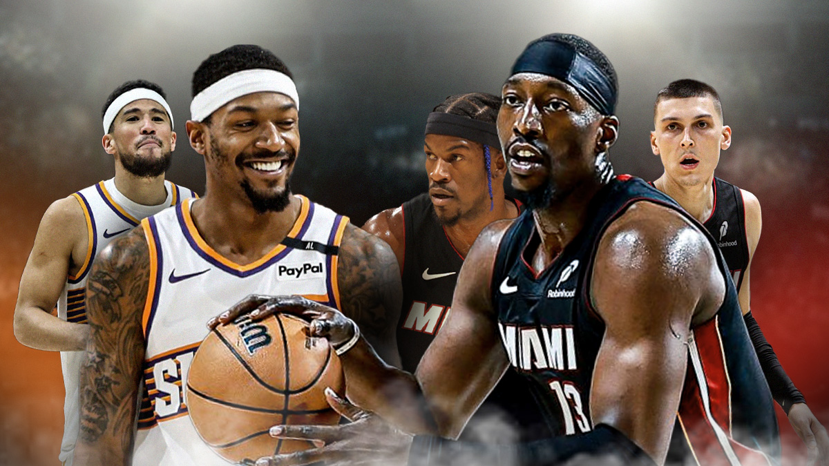 Miami Heat stars Bam Adebayo, Jimmy Butler and Tyler Herro looking at Devin Booker and Bradley Beal.