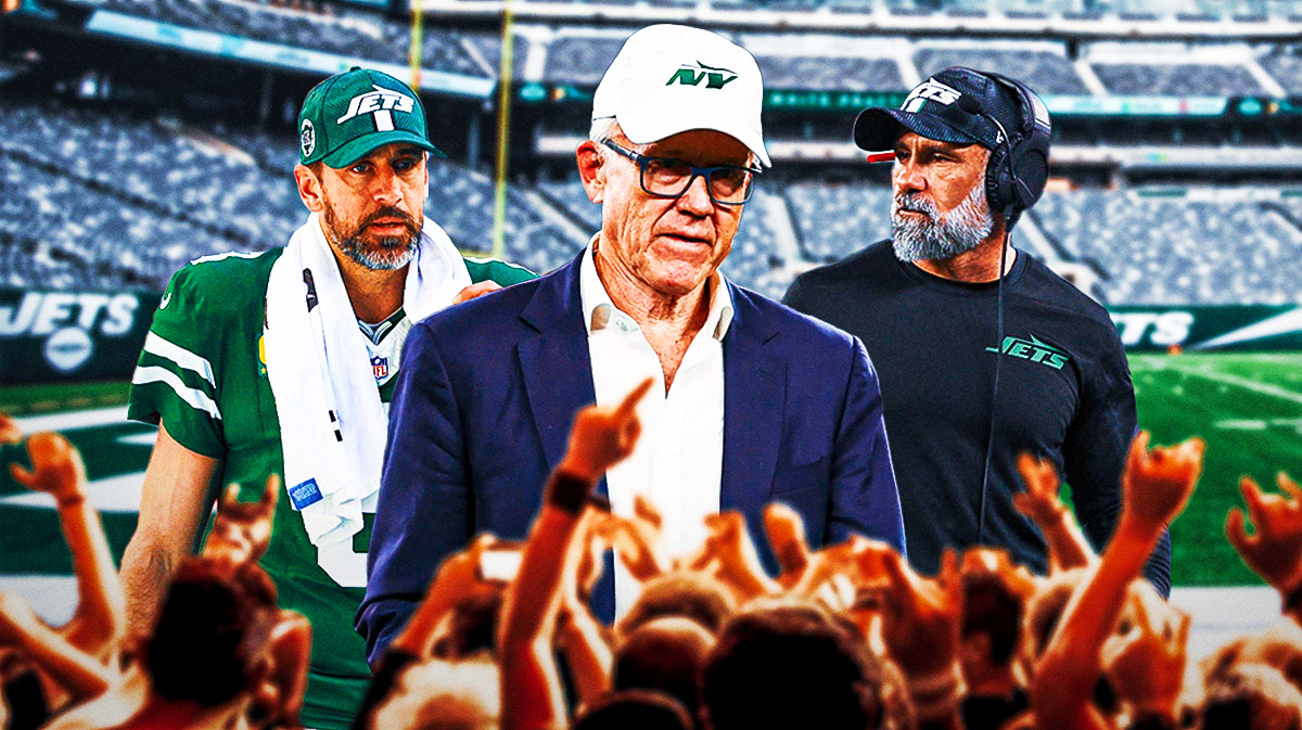 Woody Johnson, Aaron Rodgers, and Jeff Ulbrich look sad next to each other
