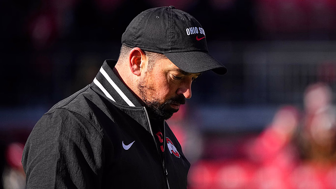 Ohio State Buckeyes head coach Ryan Day watches warm ups prior to the NCAA football game against the Michigan Wolverines at Ohio Stadium