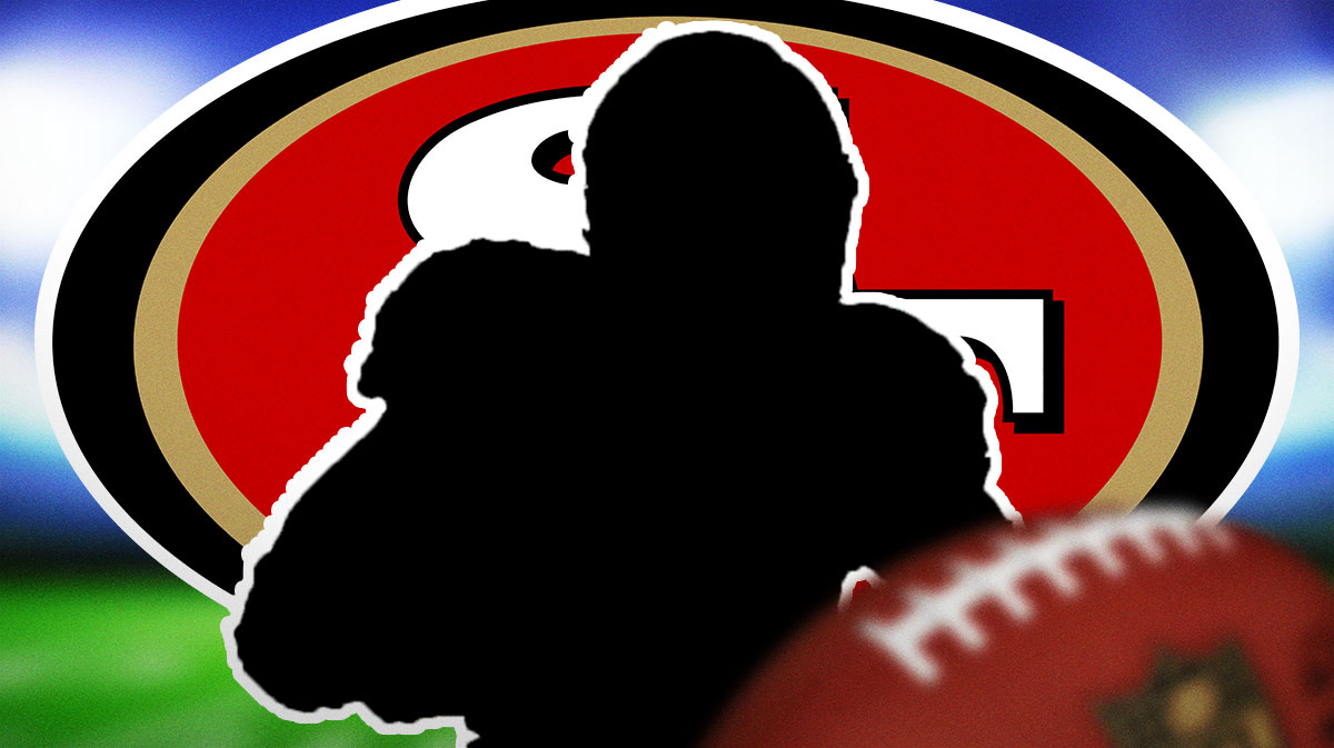 Dark silhouette of offensive lineman next to 49ers logo