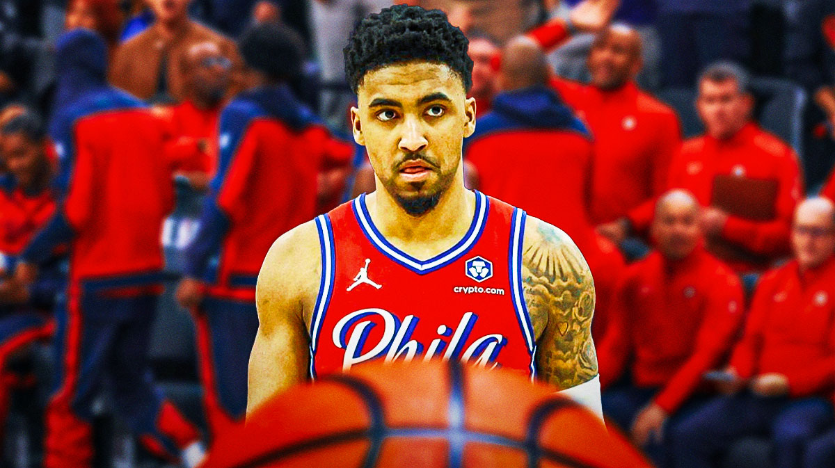 76ers KJ Martin looking serious and sitting down on an NBA sideline.