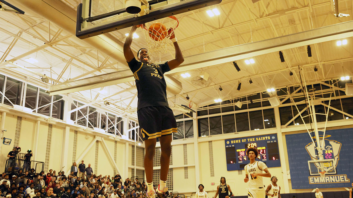 Utah Prep's AJ Dybantsa slam dunks the basketball during game Highland School at Emmanuel College