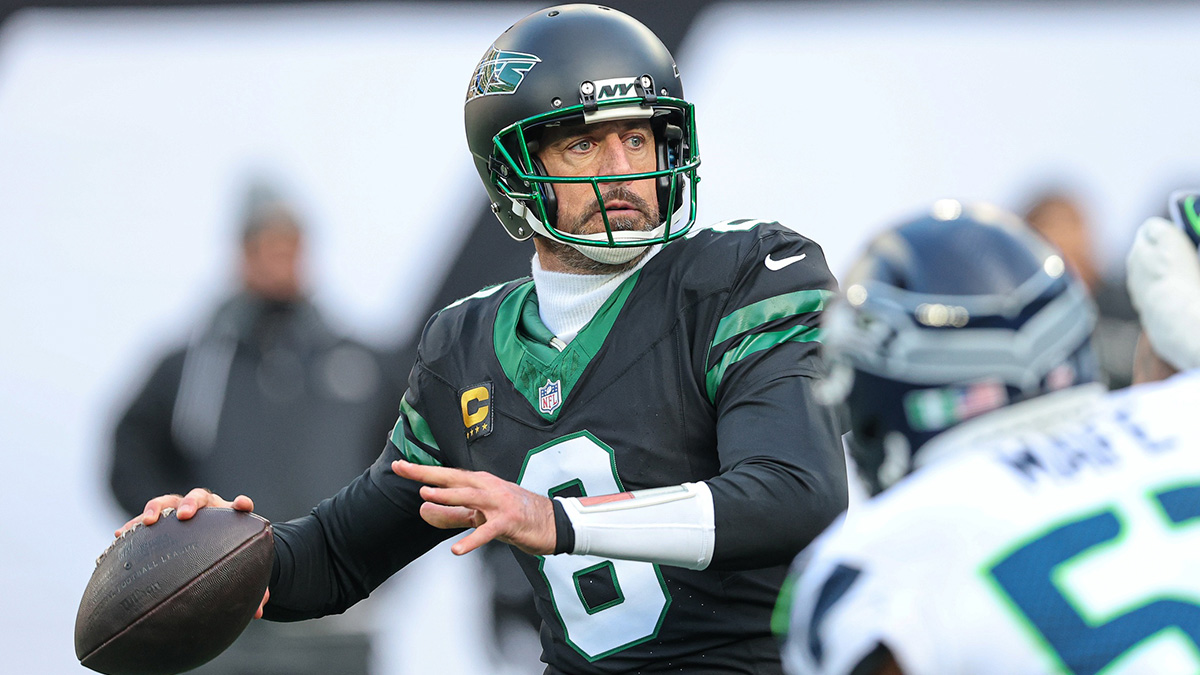 New York Jets quarterback Aaron Rodgers (8) throws the ball during the first half against the Seattle Seahawks at MetLife Stadium.