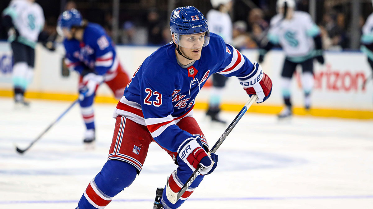 New York Rangers defenseman Adam Fox (23) skates back into the Rangers zone during the first period against the Seattle Kraken at Madison Square Garden.