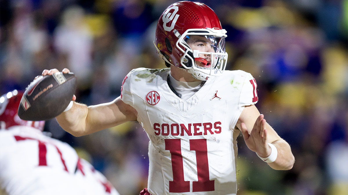Former Oklahoma football and current Auburn football quarterback Jackson Arnold (11) passes against the LSU Tigers during the fourth quarter at Tiger Stadium.