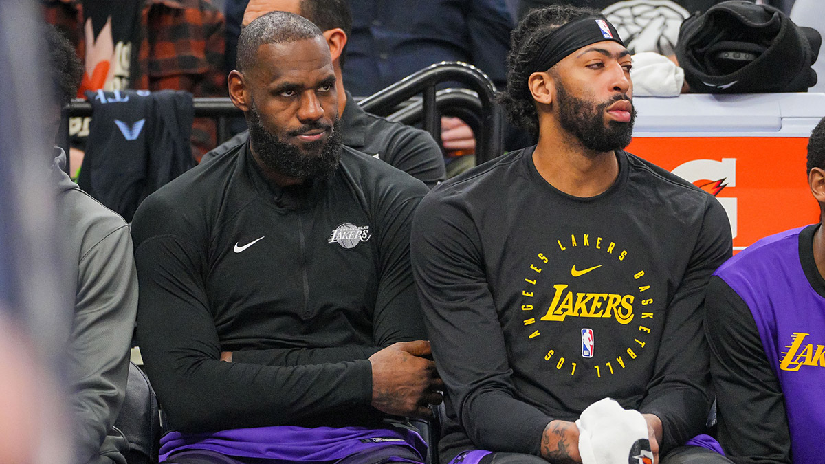 Los Angeles Lakers forward LeBron James (23) and forward Anthony Davis (3) on the bench against the Minnesota Timberwolves in the fourth quarter at Target Center.