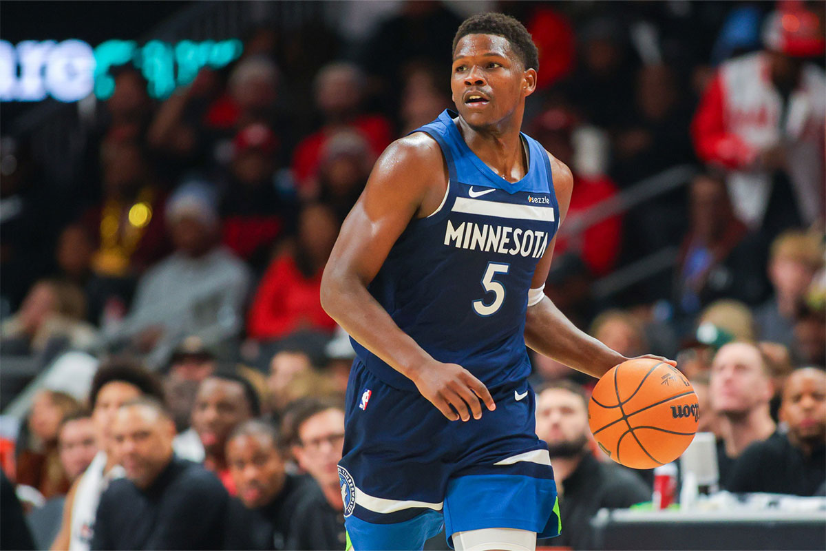 Minnesota Timberwolves guard Anthony Edwards (5) dribbles against the Atlanta Hawks during the third quarter at State Farm Arena.