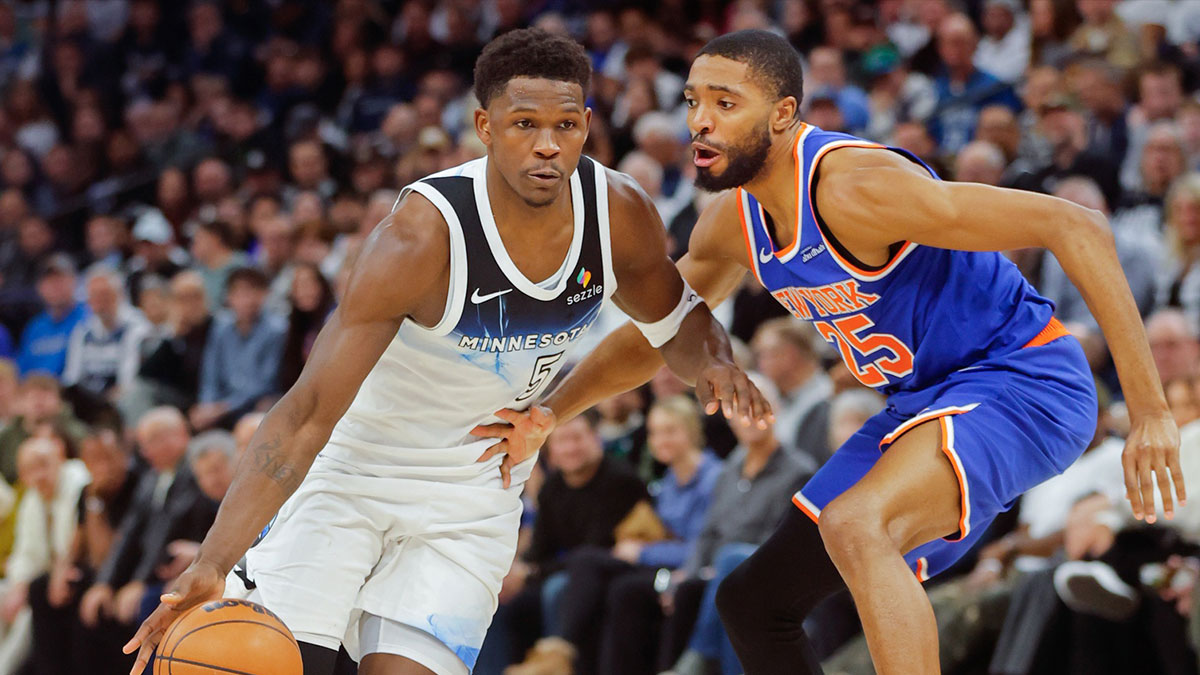 Minnesota Timberwolves guard Anthony Edwards (5) works past New York Knicks forward Mikal Bridges (25) in the third quarter at Target Center.