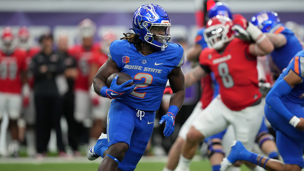 Boise State Broncos running back Ashton Jeanty (2) carries the ball against the UNLV Rebels in the first half during the Mountain West Championship at Allegiant Stadium.