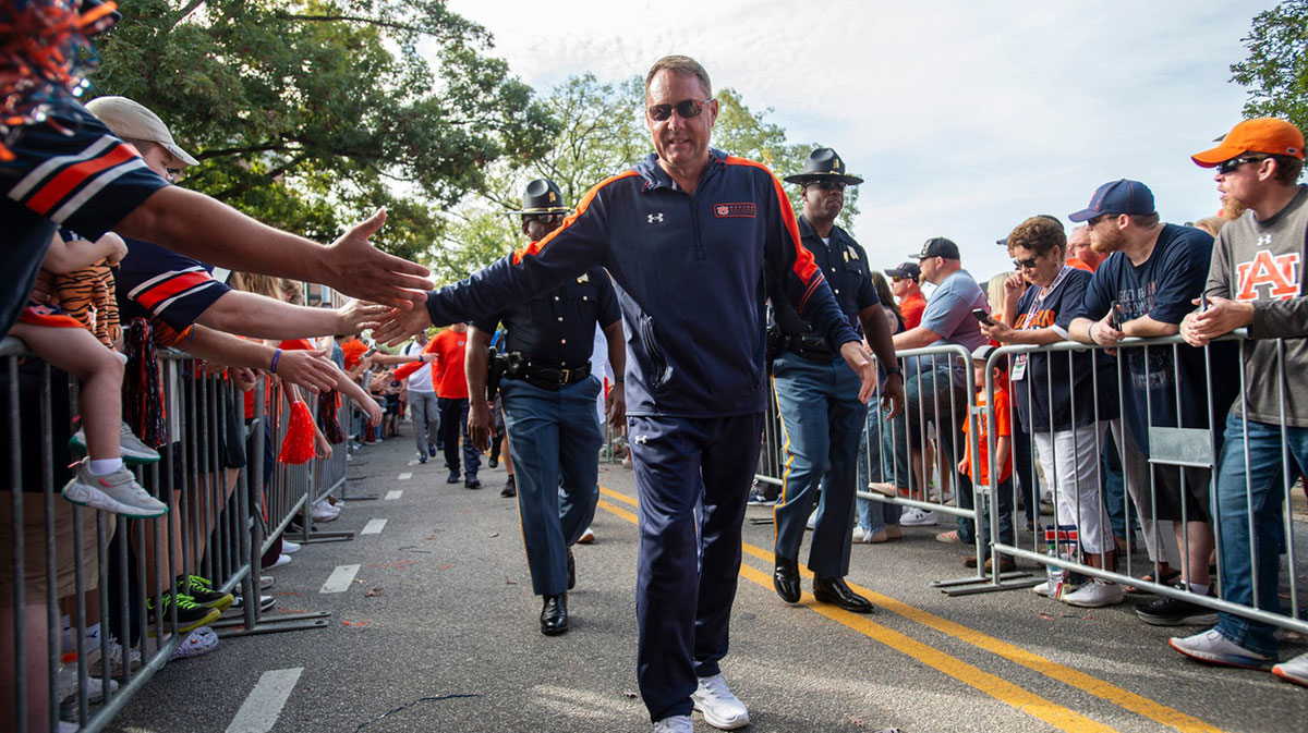 Auburn Tigers head coach Hugh Freeze greets fans during Tiger Walk before Auburn Tigers take on Vanderbilt Commodores at Jordan-Hare Stadium in Auburn, Ala., on Saturday, Nov. 2, 2024.