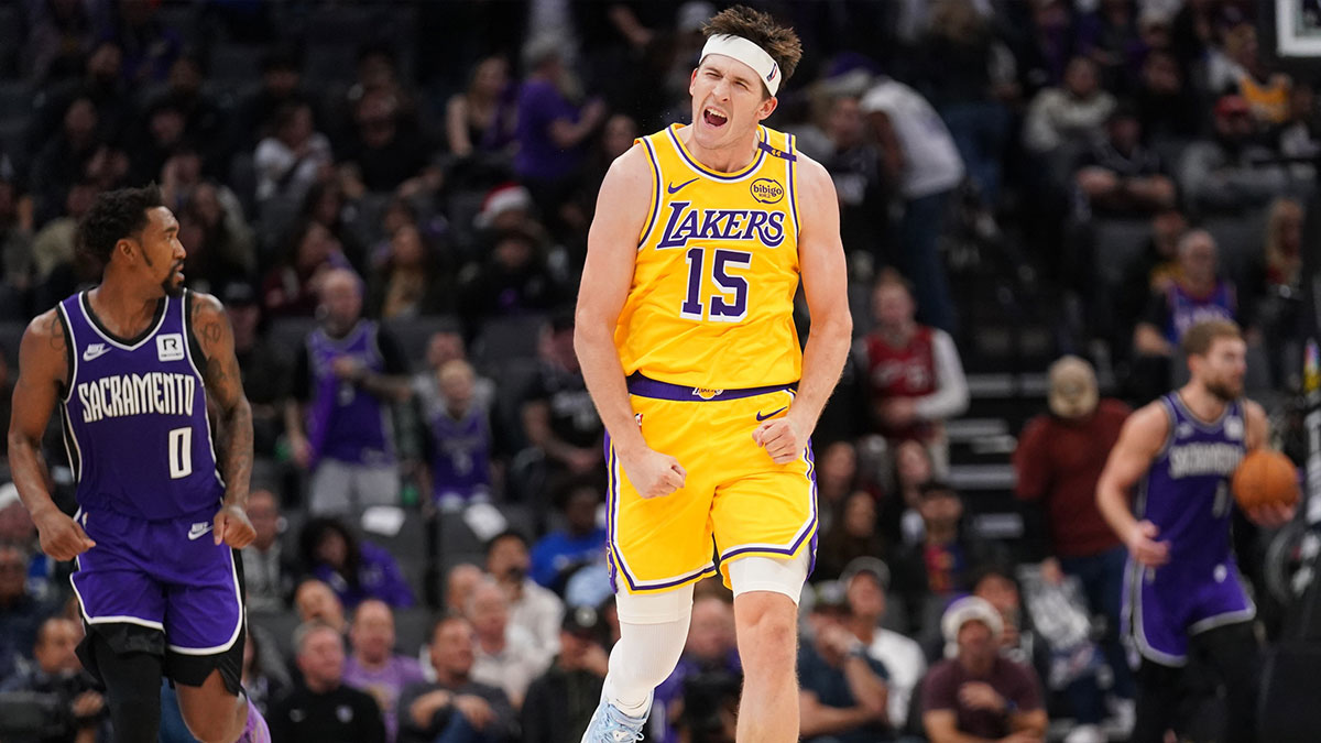 Los Angeles Lakers guard Austin Reaves (15) reacts after making a basket against the Sacramento Kings in the fourth quarter at the Golden 1 Center.