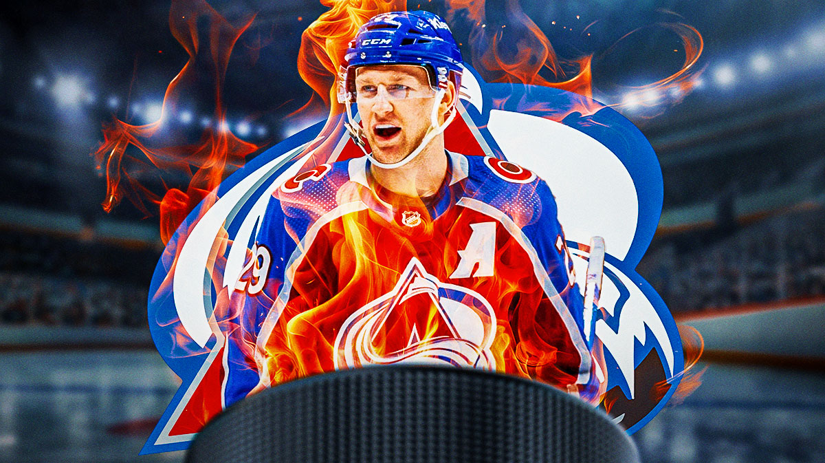 Nathan MacKinnon looking happy with fire around him, Colorado Avalanche logo, hockey rink in background
