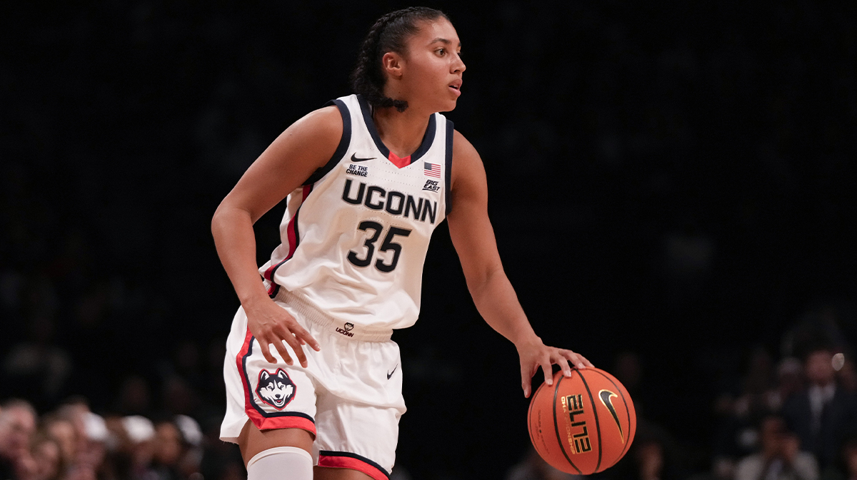 Connecticut Huskies guard Azzi Fudd (35) dribbles during the first half against the Louisville Cardinals at Barclays Center.