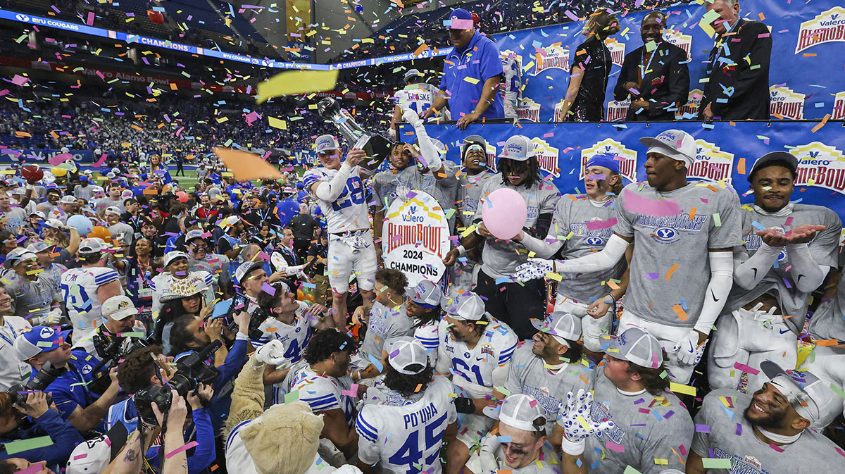 Brigham Young Cougars players celebrate after winning the Alamo Bowl against the Colorado Buffaloes at Alamodome.