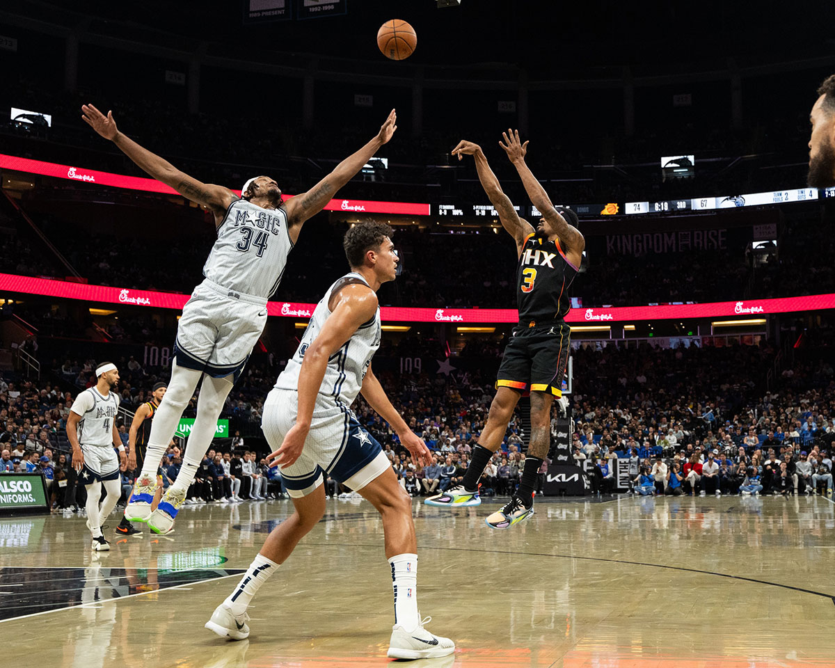 Phoenix Suns guard Bradley Beal (3) shoots the ball over Orlando Magic forward Wendell Carter Jr. in the third quarter at Kia Center.